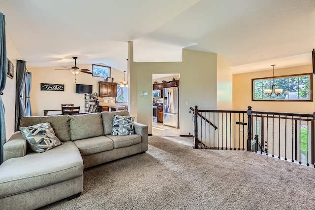 40224 Golden Way, North Branch, MN 55056 - living area with a chandelier, light colored carpet, ceiling fan, and lofted ceiling