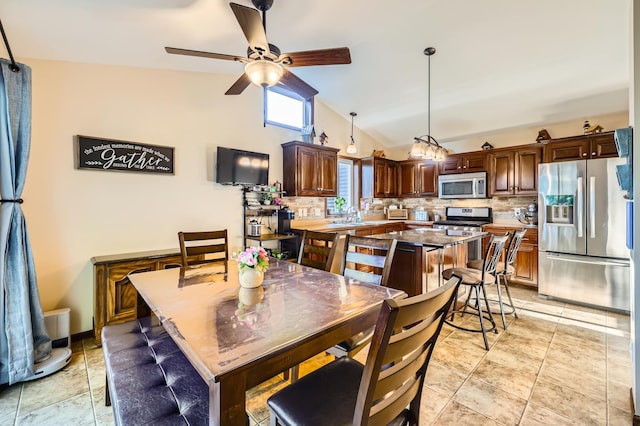 40224 Golden Way, North Branch, MN 55056 - dining area with lofted ceiling and a ceiling fan