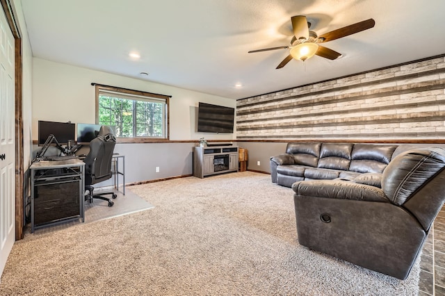 40224 Golden Way, North Branch, MN 55056 - carpeted living area with ceiling fan, wood walls, and an office area