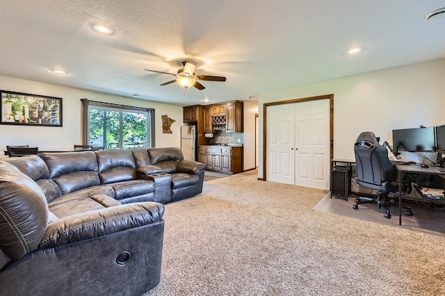 40224 Golden Way, North Branch, MN 55056 - living room with a desk, light colored carpet, ceiling fan, and recessed lighting