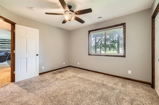 40224 Golden Way, North Branch, MN 55056 - unfurnished bedroom featuring carpet floors and ceiling fan