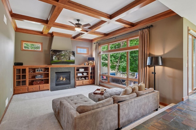 15208 Fairway Heights Rd NW, Prior Lake, MN 55372 - living area featuring a fireplace, beam ceiling, coffered ceiling, ceiling fan, and ornamental molding