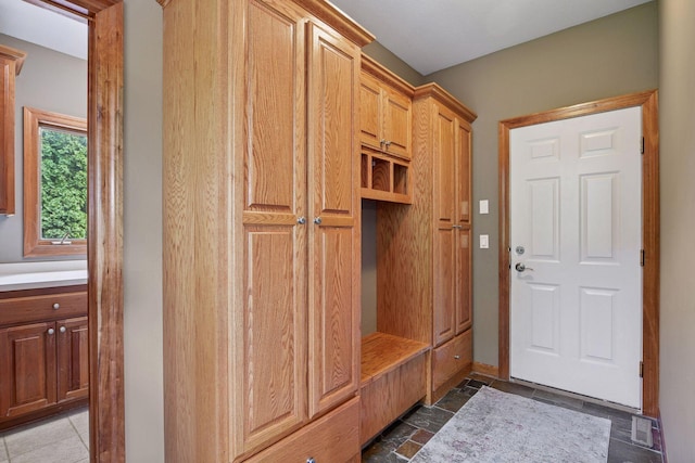 15208 Fairway Heights Rd NW, Prior Lake, MN 55372 - mudroom with stone finish flooring and baseboards