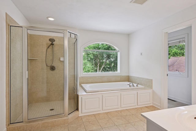 15208 Fairway Heights Rd NW, Prior Lake, MN 55372 - full bath with plenty of natural light, a garden tub, a shower stall, and recessed lighting