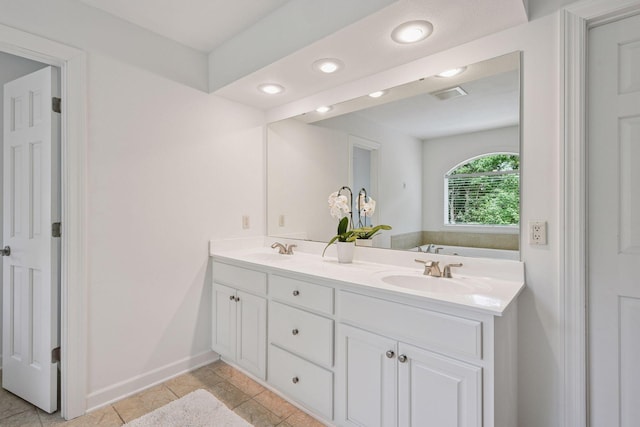 15208 Fairway Heights Rd NW, Prior Lake, MN 55372 - full bath featuring double vanity, a bath, recessed lighting, and tile patterned floors