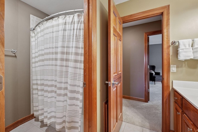 15208 Fairway Heights Rd NW, Prior Lake, MN 55372 - bathroom with vanity, a shower with shower curtain, and tile patterned flooring
