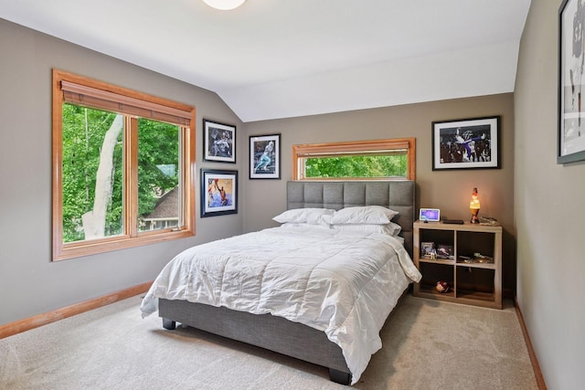 15208 Fairway Heights Rd NW, Prior Lake, MN 55372 - carpeted bedroom featuring baseboards and vaulted ceiling