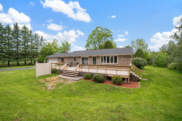 5510 Thompson Hill Rd, Proctor, MN 55810 - view of front of home featuring a front lawn, a wooden deck, brick siding, and a chimney