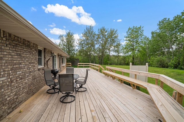 5510 Thompson Hill Rd, Proctor, MN 55810 - wooden deck with outdoor dining space and a lawn