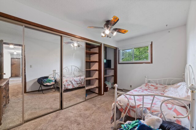 5510 Thompson Hill Rd, Proctor, MN 55810 - carpeted bedroom featuring a ceiling fan, a textured ceiling, and a closet