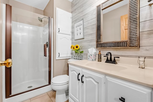 4619 Heather Way N, Oakdale, MN 55128 - bathroom featuring vanity, a shower stall, wood walls, and tile patterned flooring
