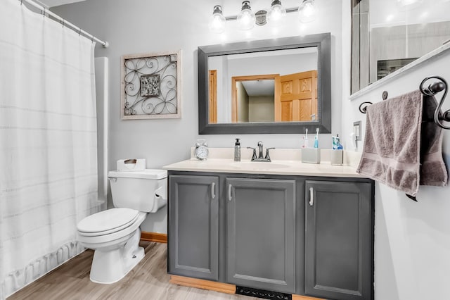 4619 Heather Way N, Oakdale, MN 55128 - full bath featuring vanity, wood finished floors, and curtained shower