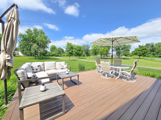 4619 Heather Way N, Oakdale, MN 55128 - wooden terrace featuring an outdoor hangout area, a lawn, outdoor dining space, and view of scattered trees