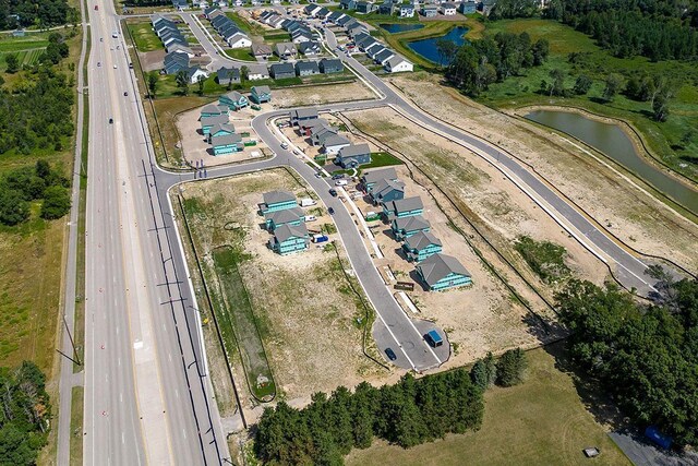 12691 Fraizer St NE, Blaine, MN 55449 - aerial overview of property's location with a large body of water and nearby suburban area