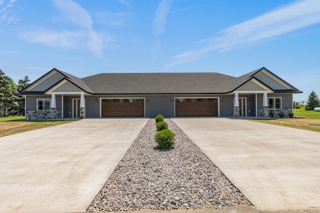 607 Colfax St, Parkers Prairie, MN 56361 - craftsman inspired home with stone siding, driveway, an attached garage, and board and batten siding