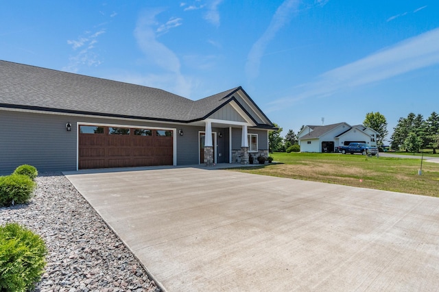 607 Colfax St, Parkers Prairie, MN 56361 - craftsman inspired home with driveway, an attached garage, a front lawn, stone siding, and board and batten siding