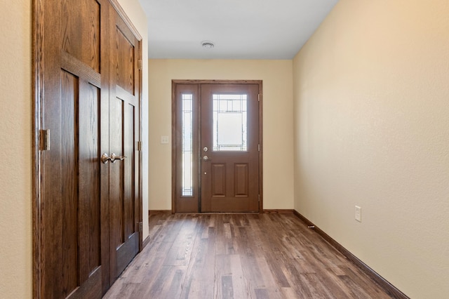 607 Colfax St, Parkers Prairie, MN 56361 - entrance foyer featuring wood finished floors and baseboards