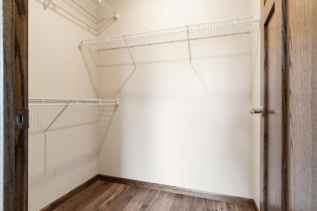 607 Colfax St, Parkers Prairie, MN 56361 - walk in closet featuring dark wood finished floors