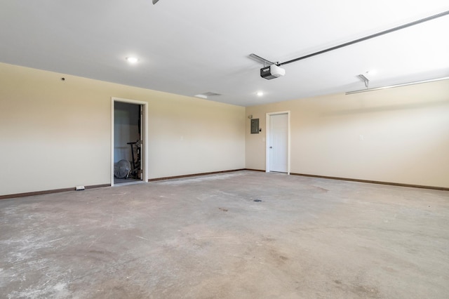 607 Colfax St, Parkers Prairie, MN 56361 - garage featuring baseboards and a garage door opener