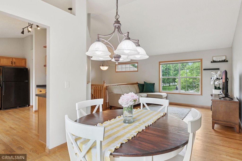 7926 Joseph Ct, Lino Lakes, MN 55014 - dining area with light wood-style floors and track lighting