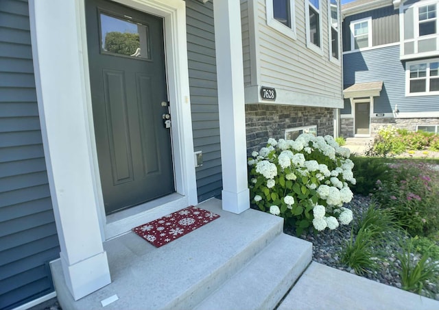 7628 Carla Path, Inver Grove Heights, MN 55076 - property entrance with stone siding