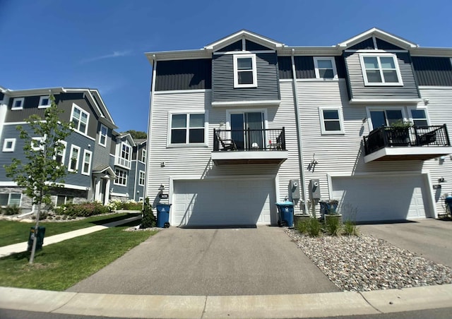 7628 Carla Path, Inver Grove Heights, MN 55076 - townhome / multi-family property with a garage, driveway, and a balcony