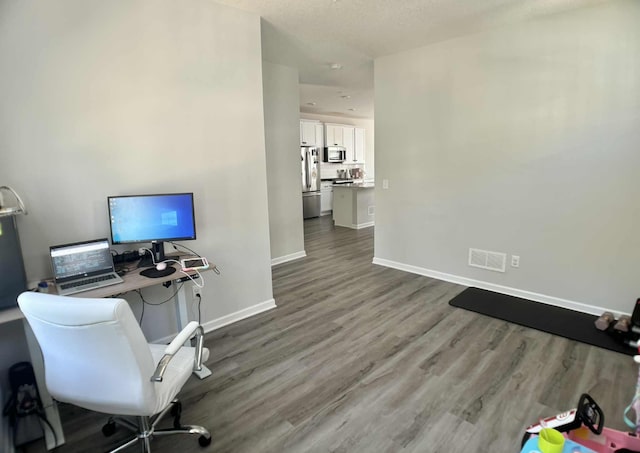 7628 Carla Path, Inver Grove Heights, MN 55076 - office space with dark wood-style floors and baseboards
