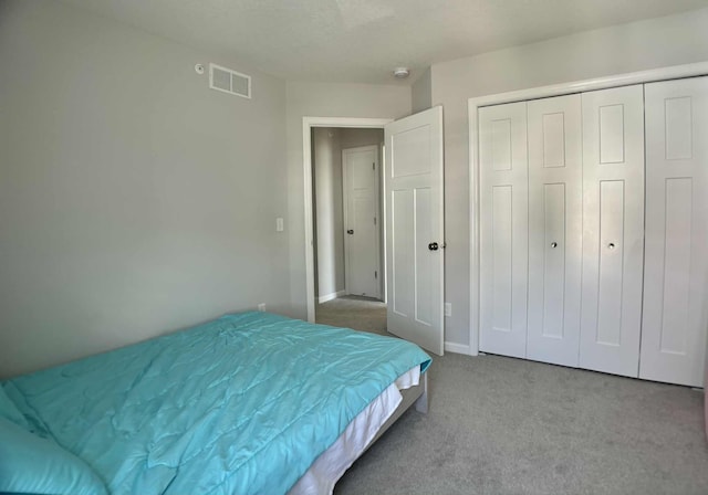 7628 Carla Path, Inver Grove Heights, MN 55076 - bedroom featuring carpet and a closet