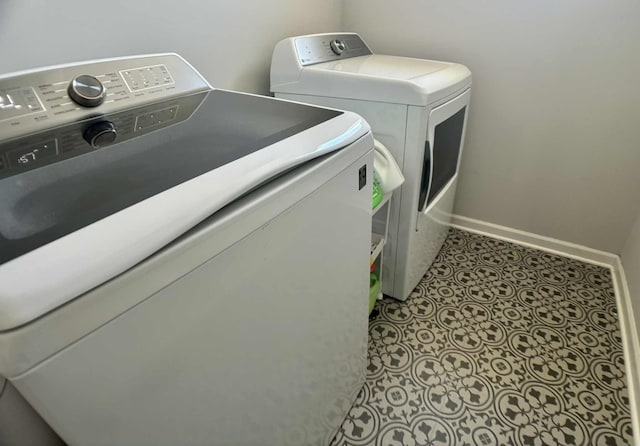 7628 Carla Path, Inver Grove Heights, MN 55076 - laundry area with washing machine and dryer and baseboards