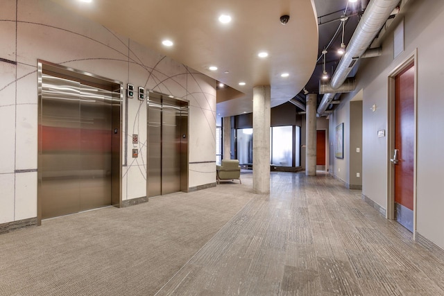 150 2nd St NE Unit B302, Minneapolis, MN 55413 - building lobby featuring recessed lighting and a surveillance system