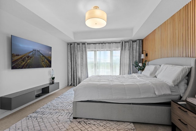 9612 Iron Horse Rd, Woodbury, MN 55129 - bedroom with a tray ceiling and carpet