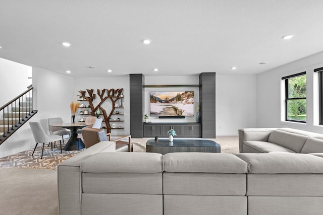9612 Iron Horse Rd, Woodbury, MN 55129 - living area with carpet flooring, recessed lighting, and stairs