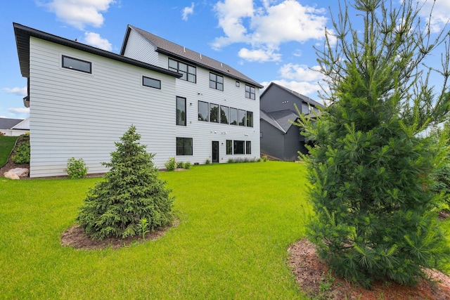 9612 Iron Horse Rd, Woodbury, MN 55129 - rear view of house with a yard