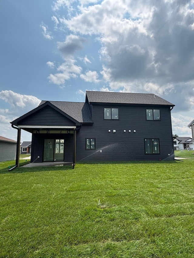 3641 18th St SE, Rochester, MN 55904 - back of property with a lawn and a patio