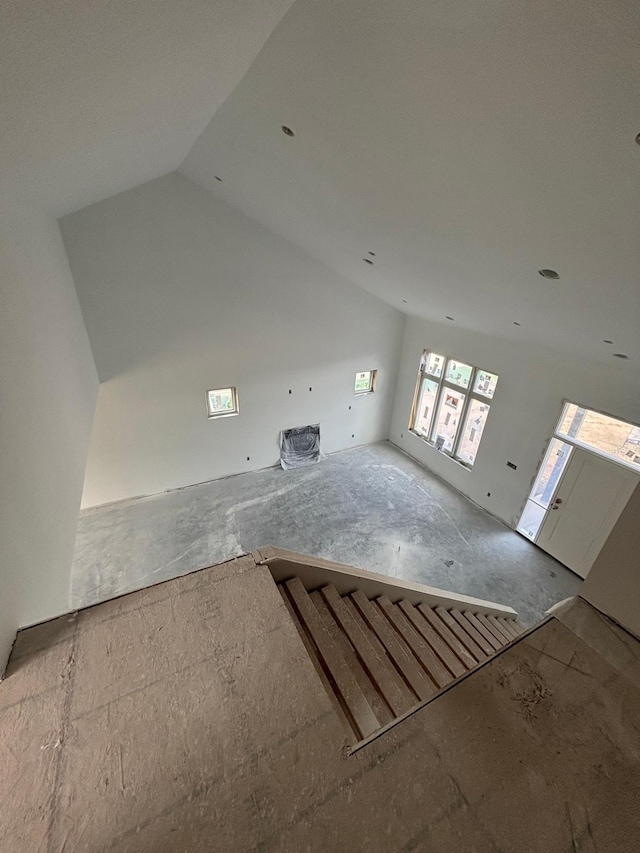 3641 18th St SE, Rochester, MN 55904 - unfurnished living room with lofted ceiling