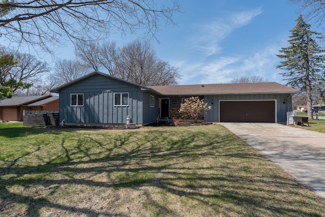 301 Nottingham Ct, North Mankato, MN 56003 - single story home featuring board and batten siding, a garage, concrete driveway, and a front lawn