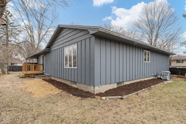 301 Nottingham Ct, North Mankato, MN 56003 - view of property exterior featuring board and batten siding and a deck