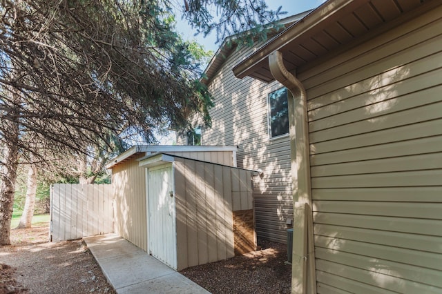 307 Hayden Lake Rd W, Champlin, MN 55316 - view of side of home with a shed