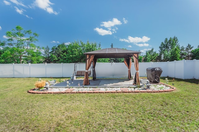 307 Hayden Lake Rd W, Champlin, MN 55316 - fenced backyard featuring a gazebo and a patio