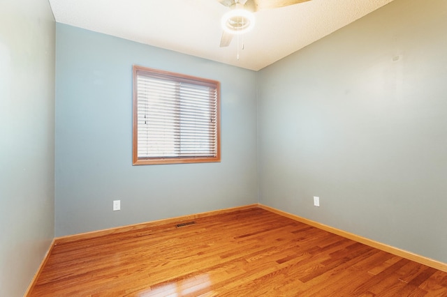 307 Hayden Lake Rd W, Champlin, MN 55316 - empty room with ceiling fan and light wood-type flooring