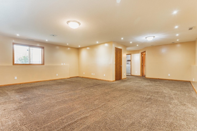 307 Hayden Lake Rd W, Champlin, MN 55316 - carpeted spare room with recessed lighting and washer / dryer