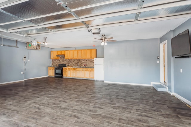 307 Hayden Lake Rd W, Champlin, MN 55316 - unfurnished living room featuring dark wood-type flooring and a garage