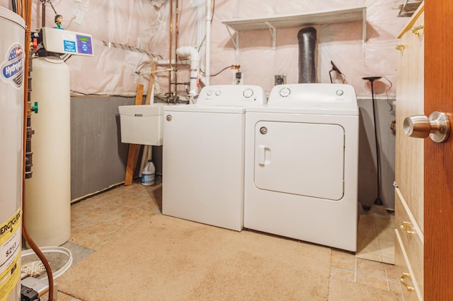 307 Hayden Lake Rd W, Champlin, MN 55316 - laundry area with washer and clothes dryer and tile patterned floors