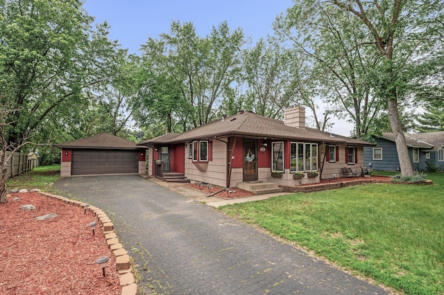 11542 Xavis St NW, Coon Rapids, MN 55433 - ranch-style home with a chimney, roof with shingles, a detached garage, and an outbuilding