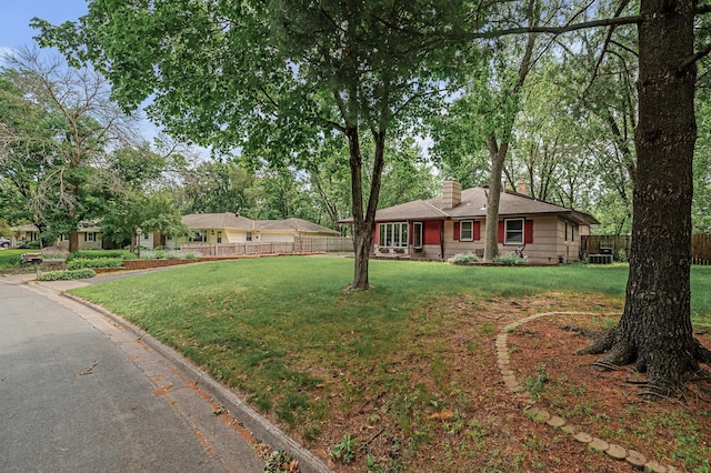 11542 Xavis St NW, Coon Rapids, MN 55433 - ranch-style home featuring a chimney