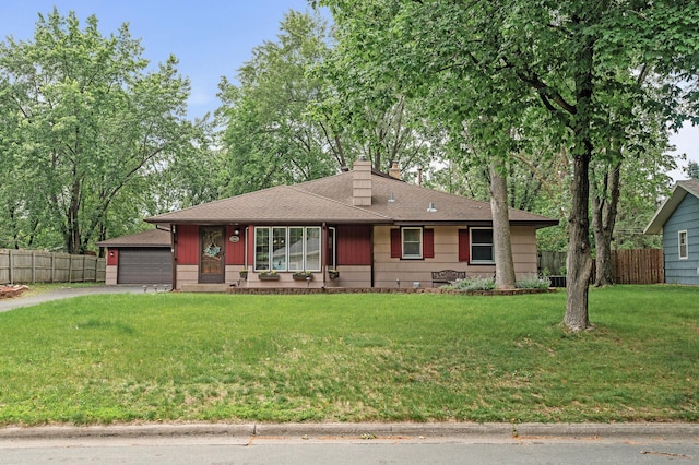 11542 Xavis St NW, Coon Rapids, MN 55433 - view of front of home with a chimney, driveway, and a shingled roof
