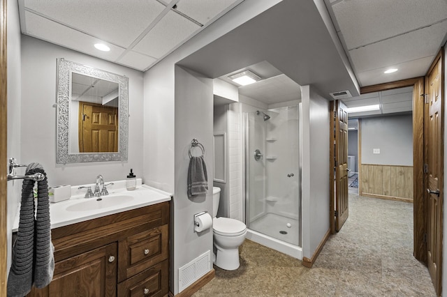 11542 Xavis St NW, Coon Rapids, MN 55433 - bathroom with a shower stall, vanity, and wood walls