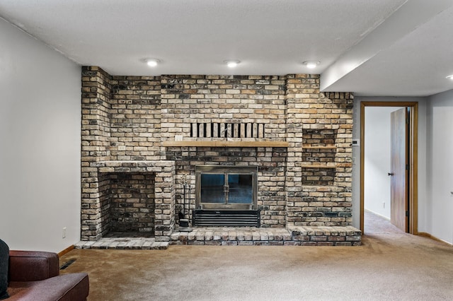 11542 Xavis St NW, Coon Rapids, MN 55433 - unfurnished living room featuring carpet and a fireplace