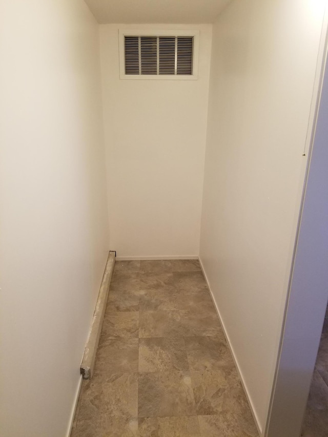 11542 Xavis St NW, Coon Rapids, MN 55433 - hallway featuring baseboards