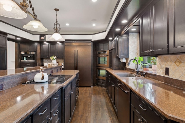 10 Apple Orchard Ct, Dellwood, MN 55110 - kitchen with dishwasher, double oven, dark stone countertops, recessed lighting, and dark wood-style flooring